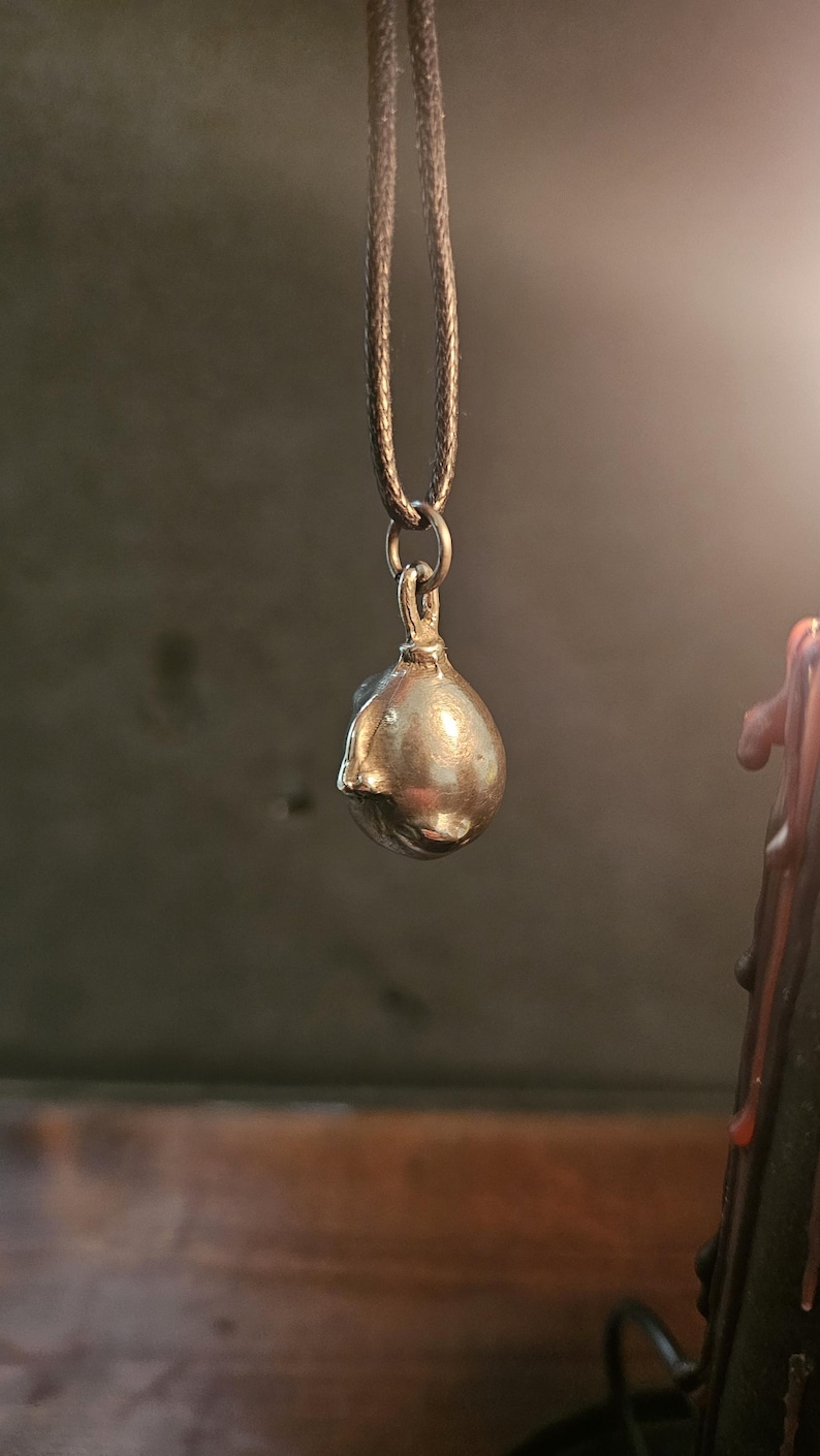 Behelit Pendant Hand Cast Pewter Berserk Necklace Anime Talisman + Cotton Cord Crimson Beherit Replica image 6