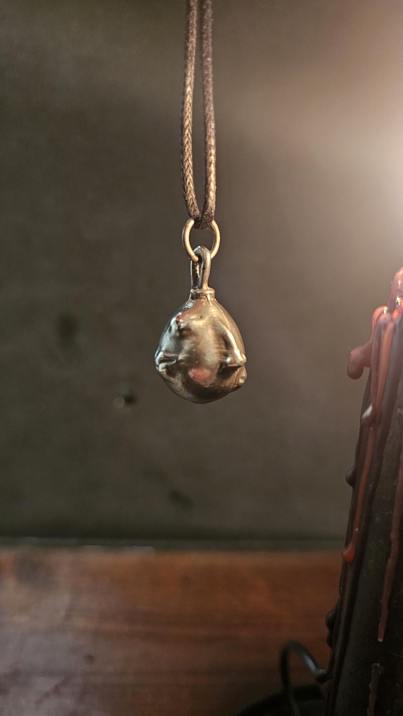 Behelit Pendant Hand Cast Pewter Berserk Necklace Anime Talisman + Cotton Cord Crimson Beherit Replica image 2