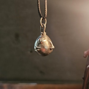 Behelit Pendant Hand Cast Pewter Berserk Necklace Anime Talisman + Cotton Cord Crimson Beherit Replica image 1