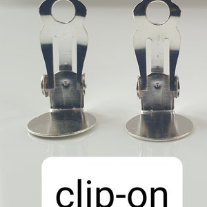 clip on earring back part which is flat back, metallic, silver color, anti allergic, nickel free and little adjustable to make them even more comfortable.