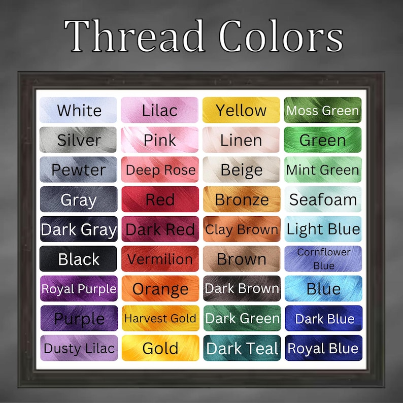 May include: A framed color chart titled "Thread Colors" displays a variety of thread colors. The chart includes colors such as white, black, red, blue, and green, with each color labeled in a rectangular box.