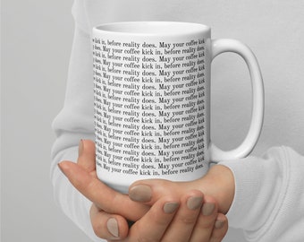 White large mug with 1899 qoute "May your coffee kick in, before reality does"