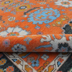 Handmade Oushak Wool Rug: Charcoal Border, Orange Floral Turkish Knot