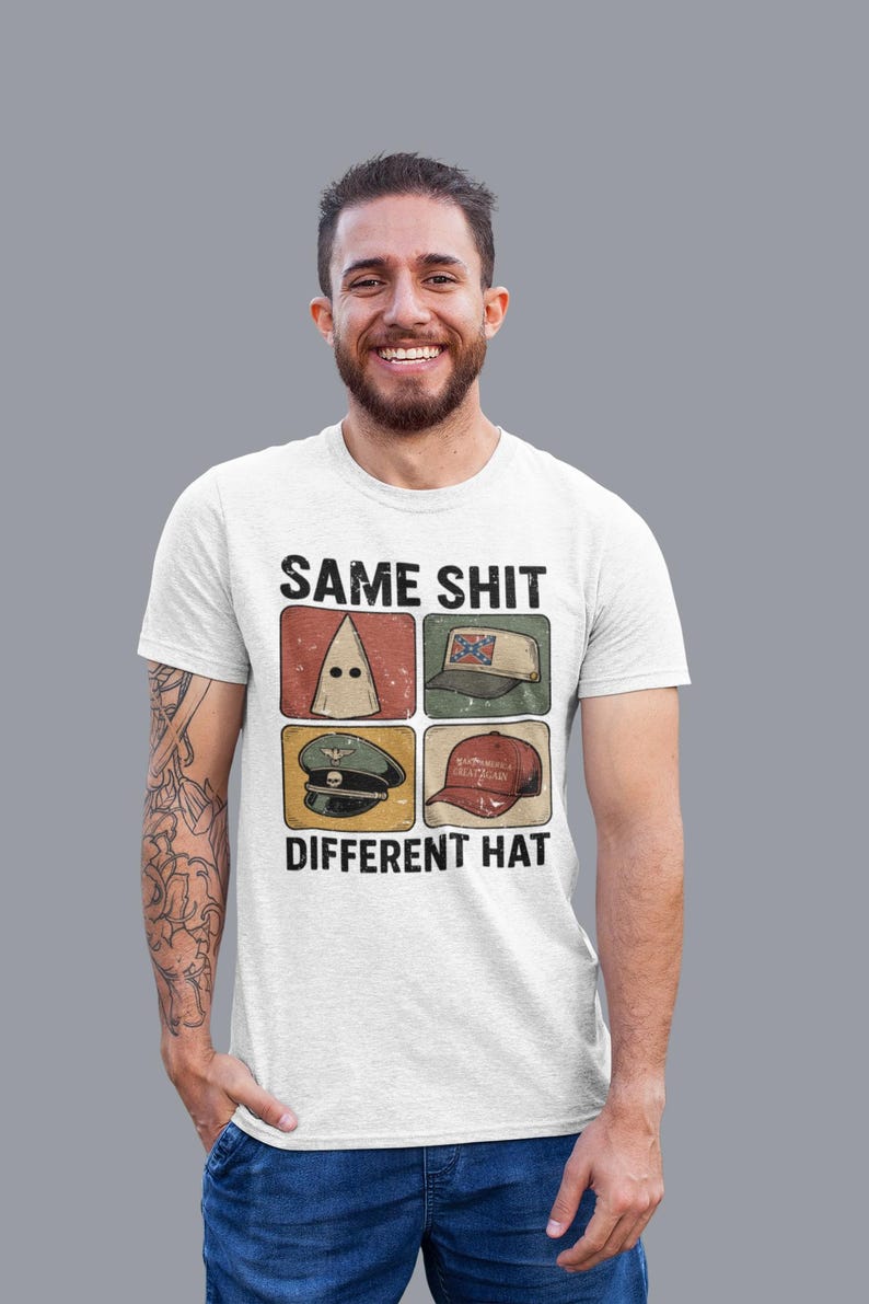 May include: White t-shirt with the text "SAME SHIT DIFFERENT HAT" and four images of hats. The hats include a white hood, a Confederate flag hat, a military hat, and a "Make America Great Again" hat.