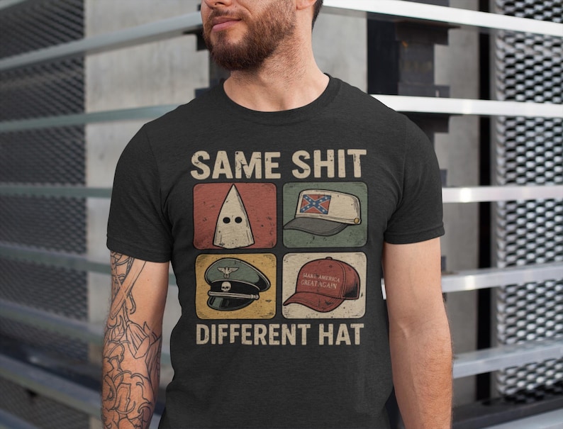 May include: Black t-shirt with the text "SAME SHIT DIFFERENT HAT" and four images of different hats. The hats include a white hood, a Confederate flag cap, a military hat, and a red "Make America Great Again" cap.