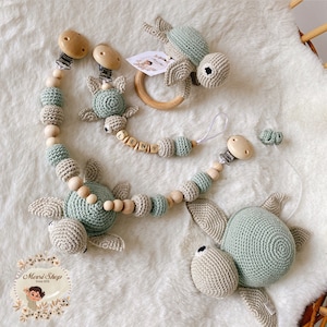 Speenketting Rammelaar Kinderwagenketting Muziekdoos Caretta Mint