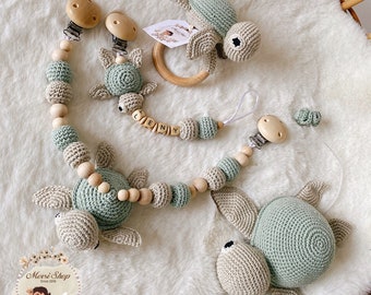 Speenketting rammelaar kinderwagenketting muziekdoos Caretta Mint