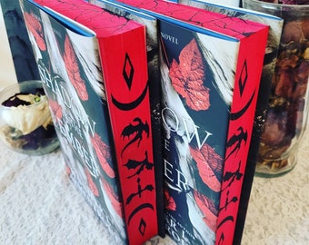 A Shadow In The Ember hardcover by JLA, with custom sprayed edges!
