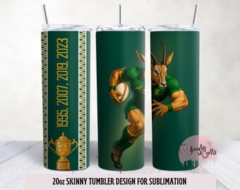 May include: A 20oz skinny tumbler with a green background and a design featuring a muscular springbok holding a rugby ball. The tumbler also has the years 1995, 2007, 2019, and 2023, along with a trophy graphic. The tumbler is designed for sublimation.