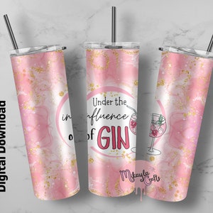 May include: Pink and gold glitter tumbler with the text "Under the influence of Gin" and a drawing of a gin and tonic. The tumbler is 20 ounces.