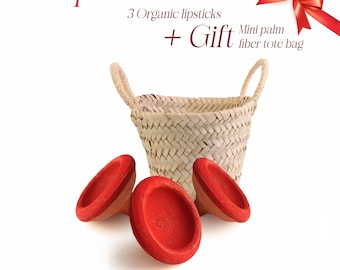 May include: Three red lipstick containers and a woven basket with the text "Special offer 3 Organic lipsticks + Gift Mini palm fiber tote bag"