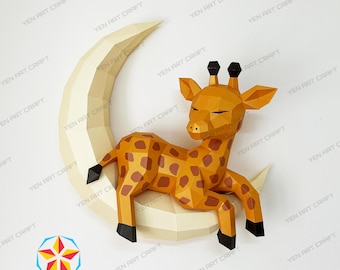 May include: A papercraft model of a giraffe sleeping on a crescent moon. The giraffe is yellow with brown spots and has closed eyes. The moon is white.