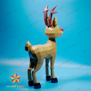 May include: A papercraft reindeer model with brown antlers, a red nose, and a light brown body. The reindeer is standing on a blue background.