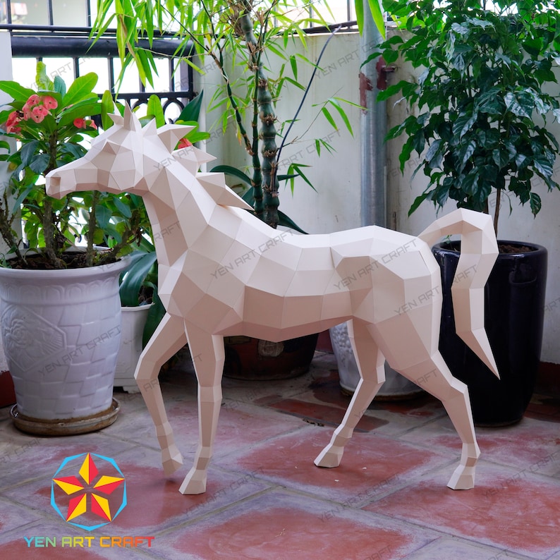 May include: A white papercraft horse sculpture with a geometric design. The horse is standing on a tiled floor with plants in pots in the background.