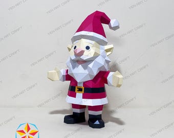 May include: A papercraft Santa Claus figure. The figure is primarily red and white, with a red hat, coat, and black boots. The figure has a white beard and a gold belt buckle. The text "YEN ART CRAFT" is visible.