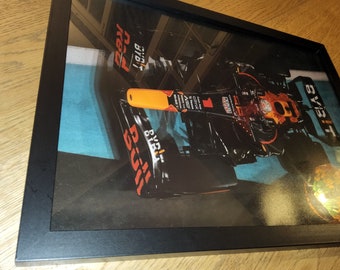 Max Verstappen F1 in a Red Bull going for the title. Poster is professionally printed and ready to hang.