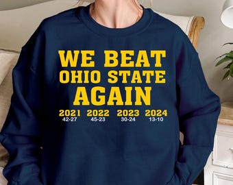 We Beat Ohio State Again Funny Unisex Crewneck Sweatshirt, Michigan Football Team Four Alarm Fire Hoodie, Celebrate The 4th Straight Victory