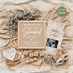 May include: A neutral-toned pregnancy announcement with a letter board that reads "WE'RE JUST AS SHOCKED AS YOU! DUE TO ARRIVE JULY 2025." Includes a baby onesie, ultrasound image, baby booties, wooden blocks spelling "BABY", and decorative elements.