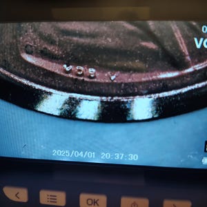 May include: Close-up of a coin with the year 1939 visible. The coin is set against a dark background. The date 2025/04/01 20:37:30 is displayed at the bottom of the screen.