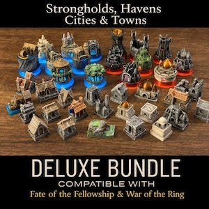 May include: A collection of miniature tabletop game buildings labelled Strongholds, Havens Cities & Towns Deluxe Bundle. The set includes various grey stone-like structures, towers, and dwellings, some mounted on translucent blue or orange circular bases.