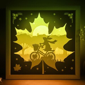 Plantilla SVG de caja de sombra de conejo, caja de luz de corte de papel de paseos de conejo cricut SVG, caja de luz de corte de papel de hoja de arce de otoño en capas 3D DXF Papercraft