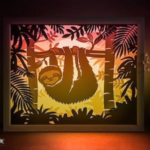 Caixa de sombra de preguiça SVG Template, Caixa de luz de papel de animal tropical cricut SVG, Folhas da selva em camadas 3D Caixa de luz de papel cortada DXF Papercraft