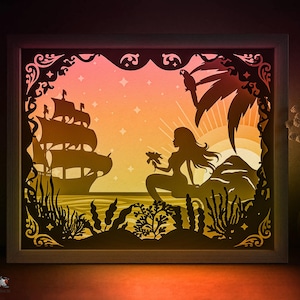 Modello SVG per scatola ombreggiata con sirena di mare, modello SVG per scatola luminosa romantica con taglio di carta all'alba, modello SVG per scatola luminosa con taglio di carta da favola a strati 3D DXF Papercraft