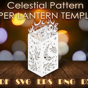 May include: White paper lantern template with a celestial pattern featuring moons, stars, and leaves. The template is for a 3D paper lantern that can be assembled and decorated.