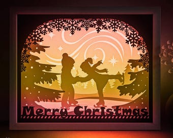 Plantilla SVG de caja de sombras de Feliz Navidad, patinaje de cuento de hadas de invierno, caja de luz cortada en papel, cricut SVG, caja de luz cortada en papel en capas 3D, DXF, Papercraft