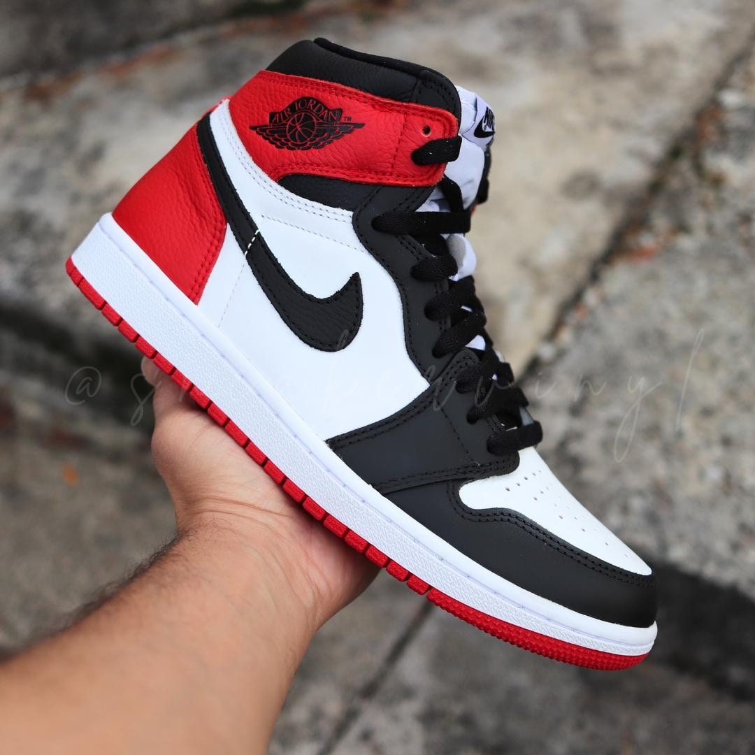 red black and white high top jordans