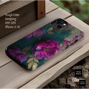May include: A teal phone case with a floral design featuring pink and purple flowers with gold accents. The case is compatible with Samsung S20-S24 and iPhone 11-15.