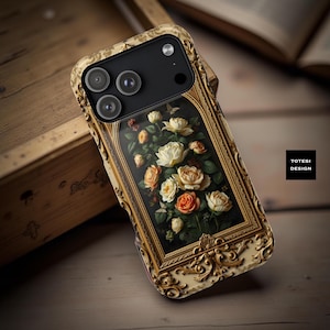 May include: A decorative phone case featuring a floral painting with white and orange roses. The case has a gold ornate frame design and the text "TOTESI DESIGN".