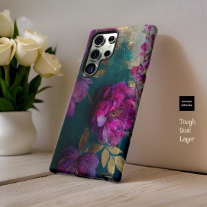 May include: A teal phone case with a floral design featuring pink and purple flowers and gold accents. The case is labeled "Tough Dual Layer" and "Totesi Design".