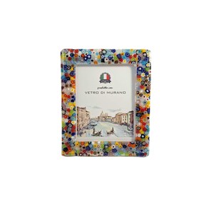 May include: A rectangular picture frame with a colorful mosaic design. The frame is decorated with small, multi-colored glass pieces. The frame holds a picture of a canal scene with gondolas. The text "Vetro di Murano" is visible.