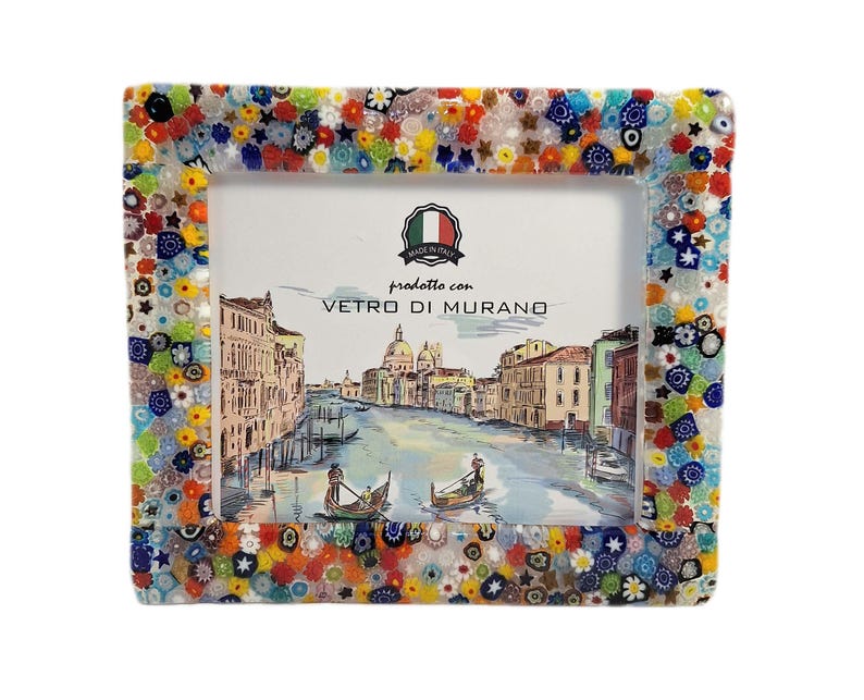May include: Rectangular photo frame with a colorful mosaic border. The frame features a detailed illustration of a Venetian canal scene. The text "prodotto con VETRO DI MURANO" and "MADE IN ITALY" are visible.