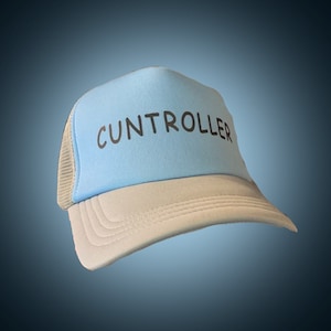 May include: A light blue and white trucker hat with the word "CUNTROLLER" printed in black across the front. The hat has a mesh back and a curved brim.