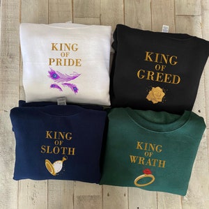 アナ・フアン マーチャンダイズ 刺繍入りスウェットシャツ、怠惰の王、傲慢の王、強欲の王、怒りの王、罪の王、本好きのギフト ESH666-669.H