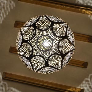 Moroccan Brass Pendant Light – Hand-Pierced Globe Lamp with Shadow Patterning for Boho & Modern Spaces