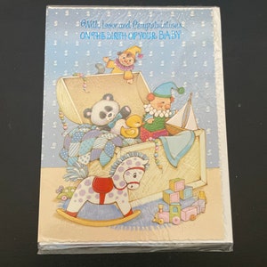 Tarjeta de felicitación de felicitaciones por el nacimiento de tu bebé.