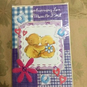 Tarjeta de felicitación de aniversario con amor a mamá y papá