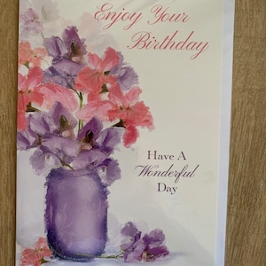 Cartão de felicitações de feliz aniversário com flores