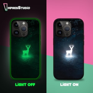 May include: Black phone case with a glowing white deer design. The case has a dark blue background with a starry night effect. The words "LIGHT OFF" and "LIGHT ON" are displayed. The brand name "ImpressStudio" is at the top.