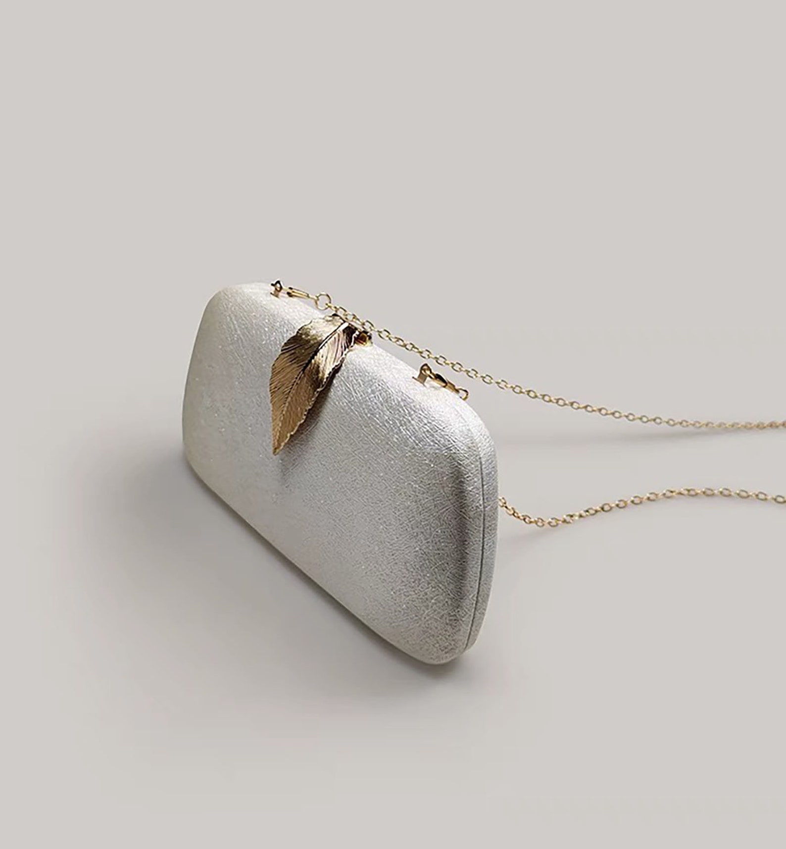 Classic Vintage Metallic Silver Clutch With Gold Leaf Clasp Clutches