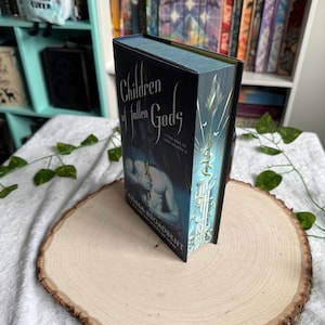 War of Lost Hearts Series by Carissa Broadbent with sprayed edges. Daughter of No Worlds, Children of Fallen Gods. Children of Fallen G