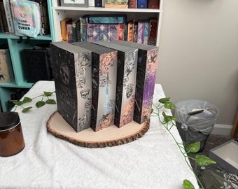 Gods & Monsters series by Amber V Nicole with sprayed edges