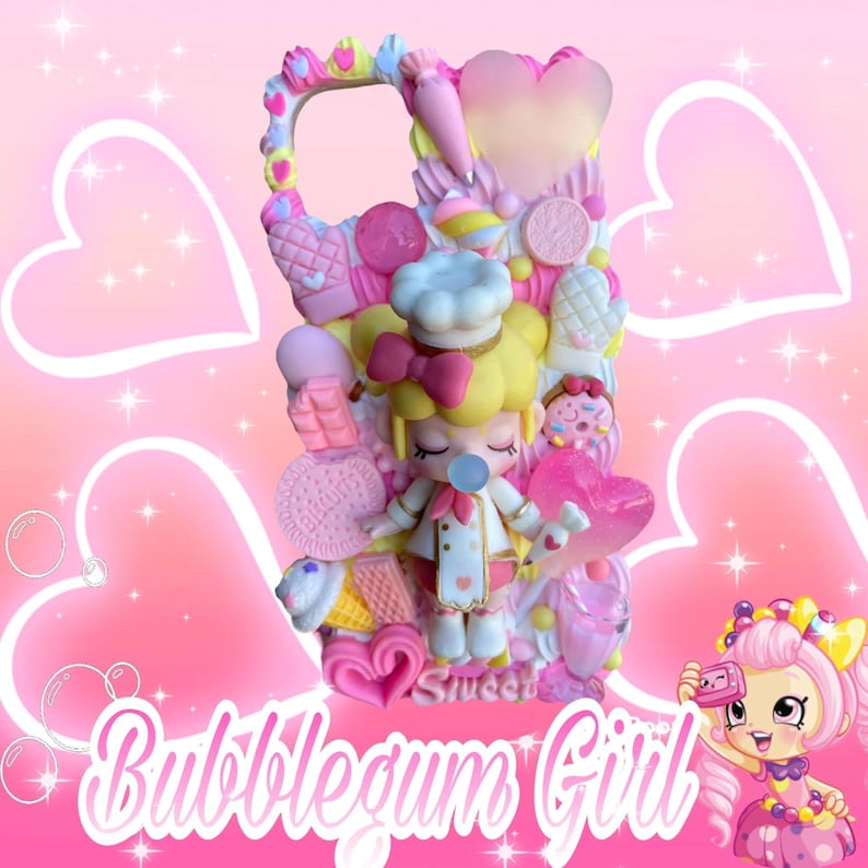 May include: A decorative phone case featuring a chef doll with a bubblegum bubble, surrounded by pink and white sweets. The case is adorned with hearts, cookies, and ice cream cones. The words "Bubblegum Girl" are written in a cursive font.