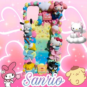 May include: A colorful phone case featuring Sanrio characters like Hello Kitty, My Melody, and others. The case is decorated with pastel-colored frosting, bows, and other decorative elements. The word "Sanrio" is written in a purple script font.