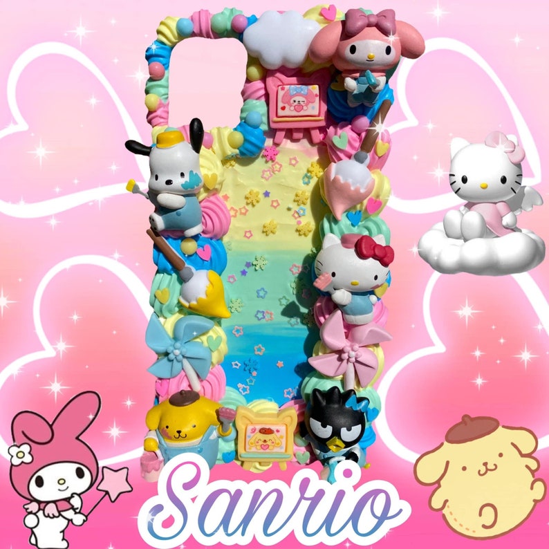 May include: A colorful phone case featuring Sanrio characters like Hello Kitty, My Melody, and others. The case is decorated with pastel-colored frosting, bows, and other decorative elements. The word "Sanrio" is written in a purple script font.