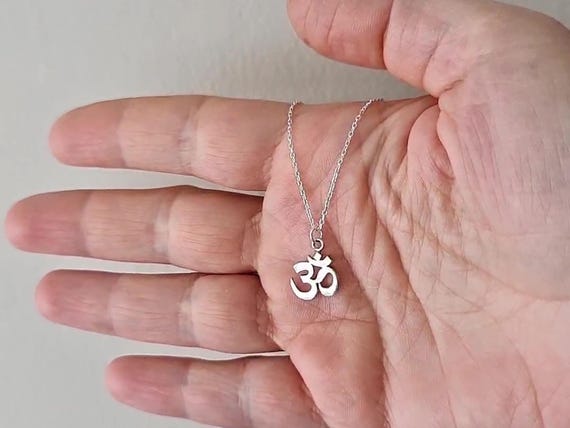 Tiny om jewellery clearance