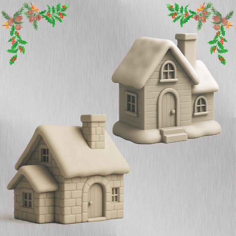 May include: Two beige miniature houses with snow-covered roofs and chimneys. One house has a brick facade, while the other has a wooden plank design. Both have arched doorways and small windows. Festive greenery decorates the top corners.